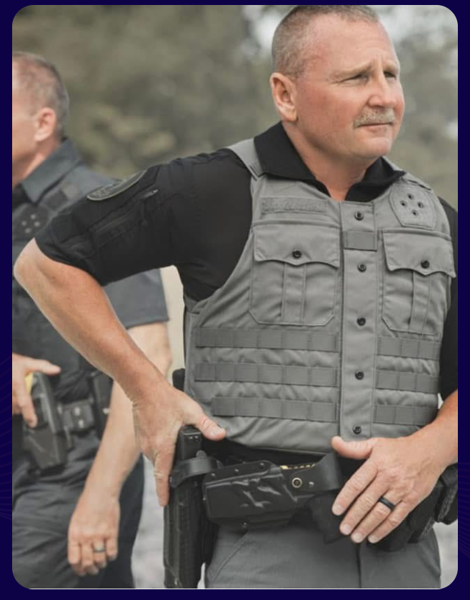 Officer wearing protective outer carrier